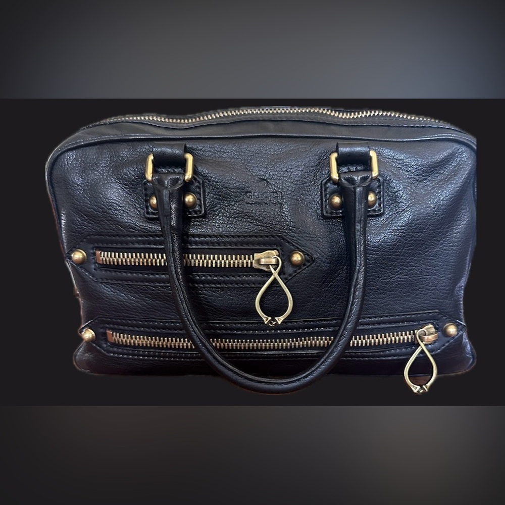 Authentic Vintage Gucci Black Leather Handbag
Gold Tone Hardware